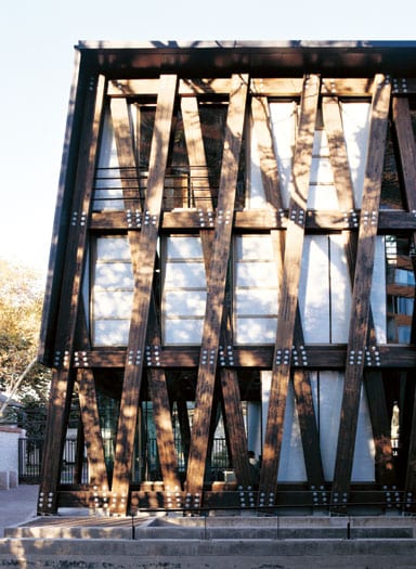 The building is clad in Radiata pine encasing a glass façade