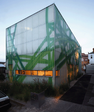 The building is clad in Radiata pine encasing a glass façade The building is clad in Radiata pine encasing a glass façade