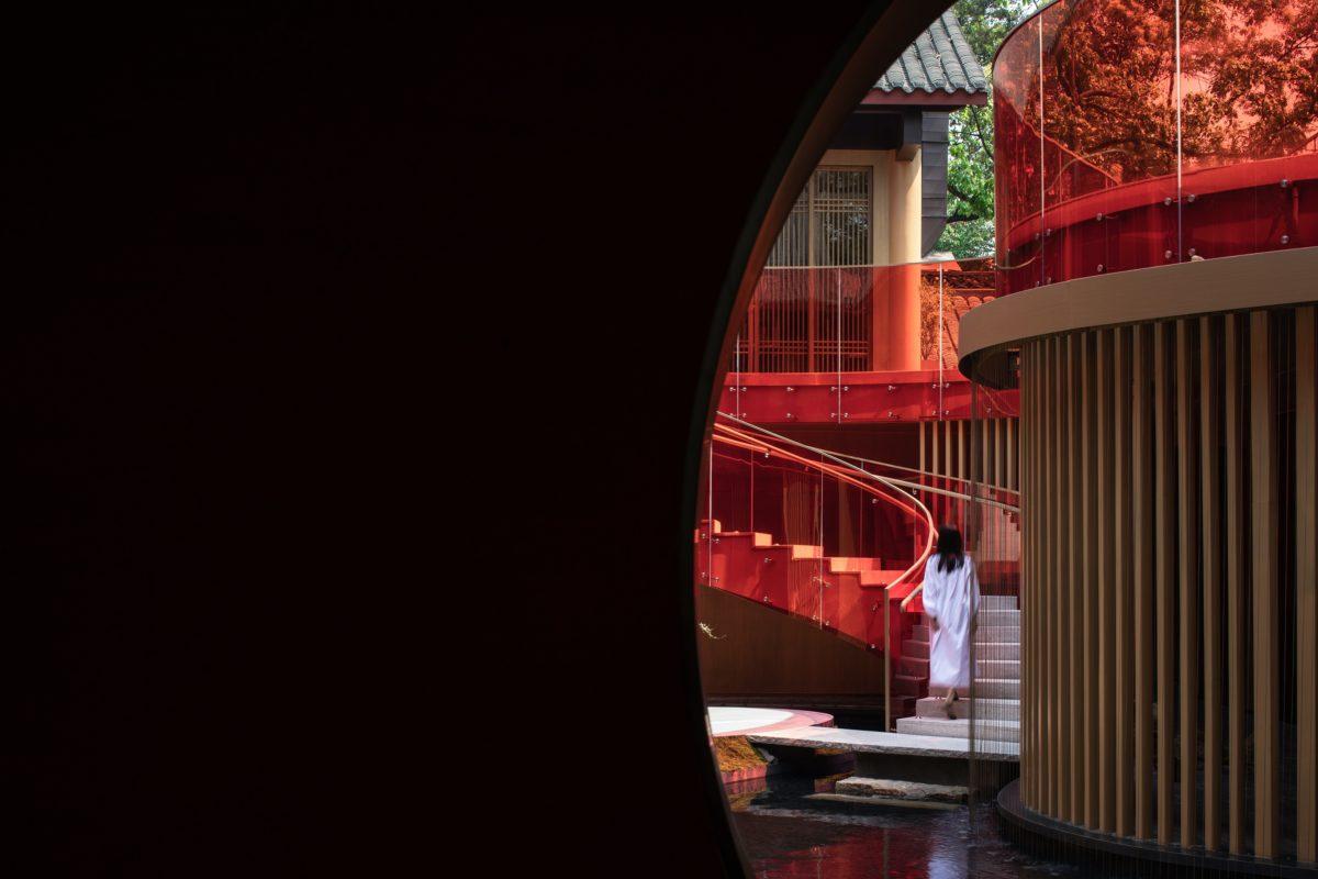 Kuansan Town Restaurant Chengdu China MUDA-Architects China architecture red architecture contemporary architecture woman walking stairs