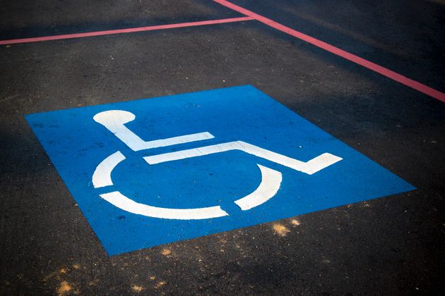 wheelchair symbol on a car parking space ICON