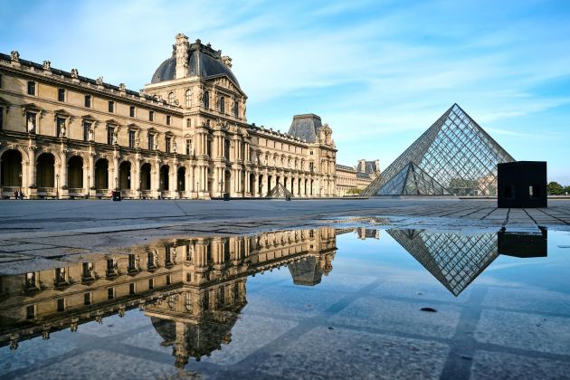 The Louvre - Its design mirrors the proportions of the Great Pyramid of Giza in Egypt.
