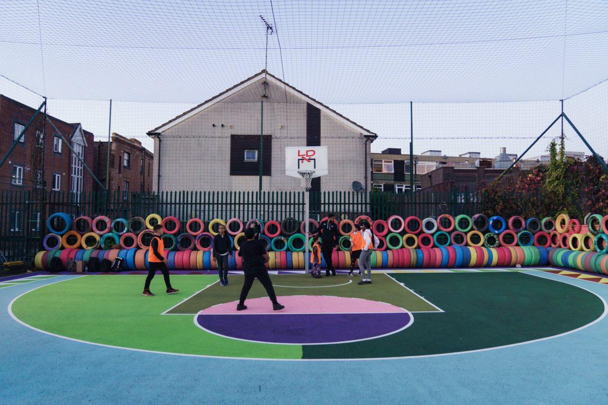 Alvaro Barrington basketball court Bethnal Green London kids playing