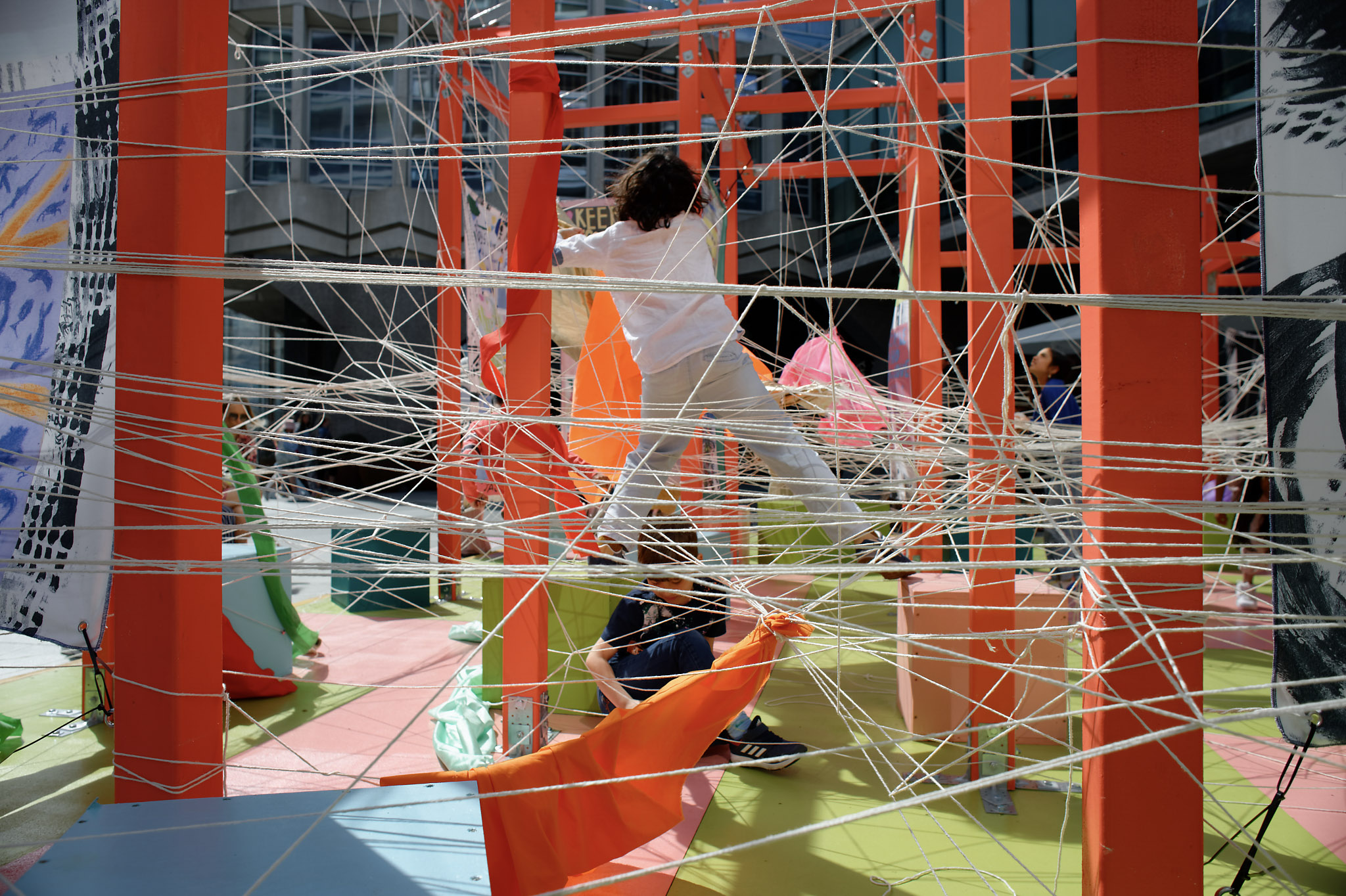 Mile of String London Festival of Architecture children playing red
