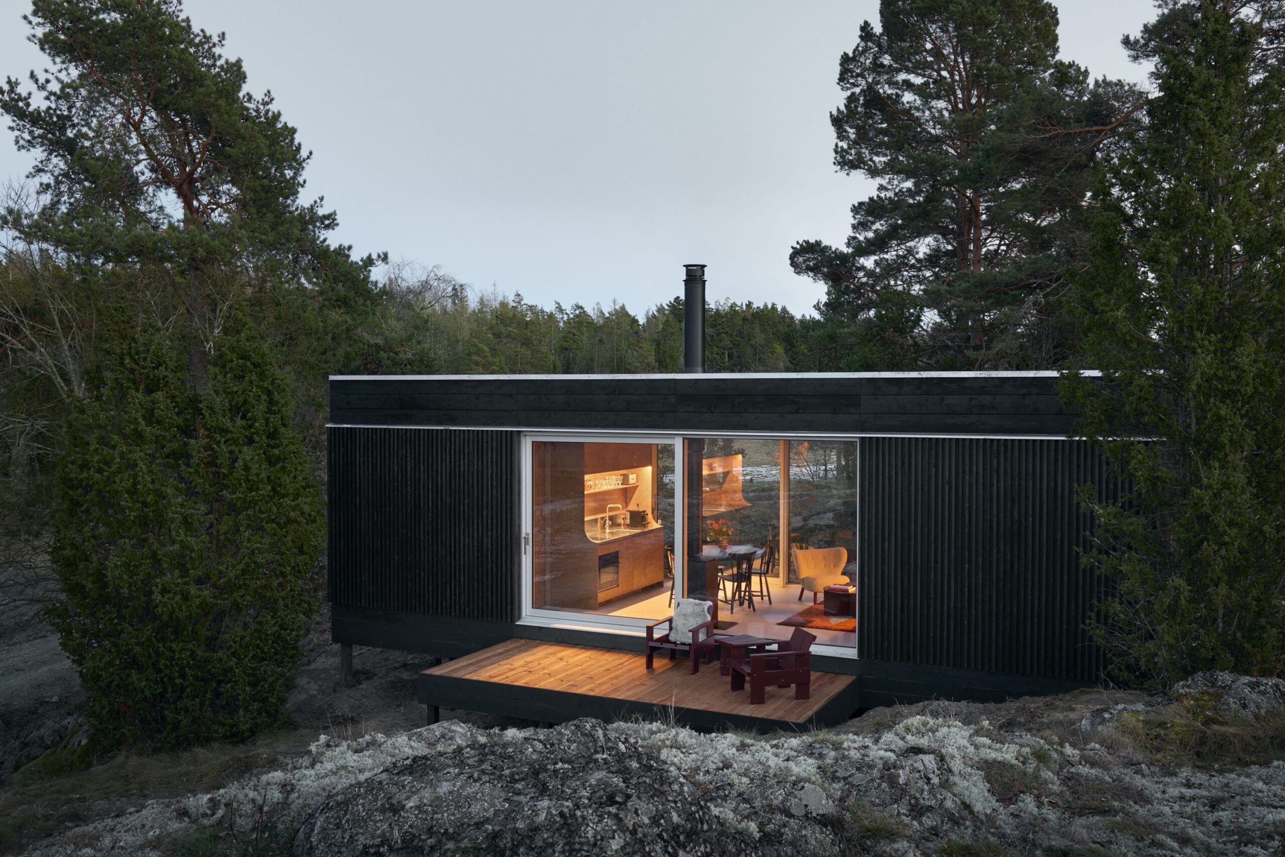 Black cabin contemporary Swedish countryside Landet Stay Andreas Martin-Löf 