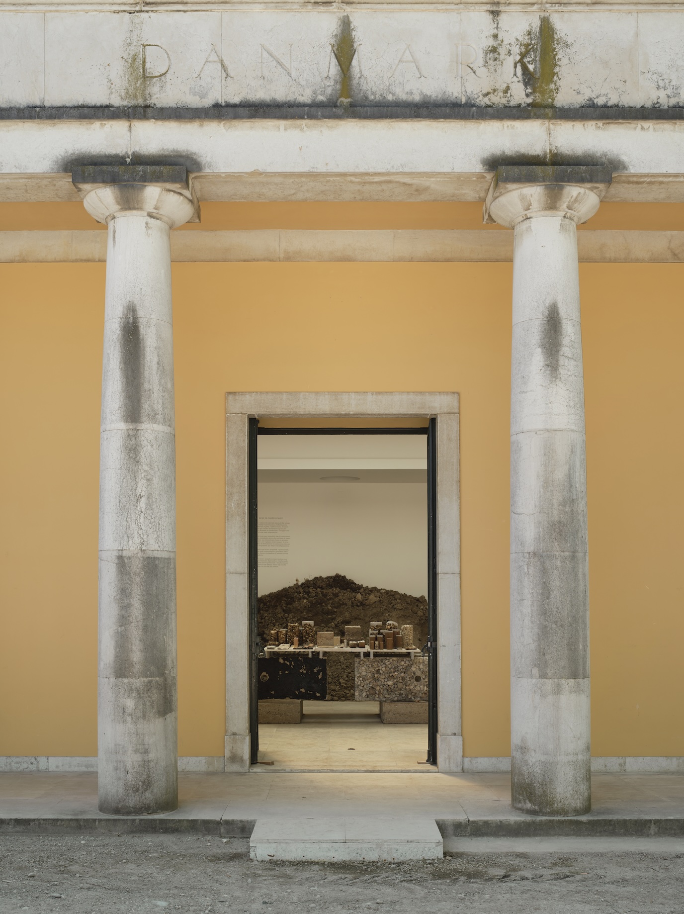 Build of Site 2025 Venice Architecture Biennale Danish Pavilion exterior yellow facade